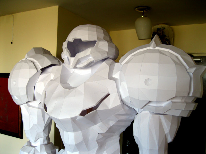 Illustration for article titled Stand in Awe of This Life-Sized Metroid Statue (Made of Paper!)
